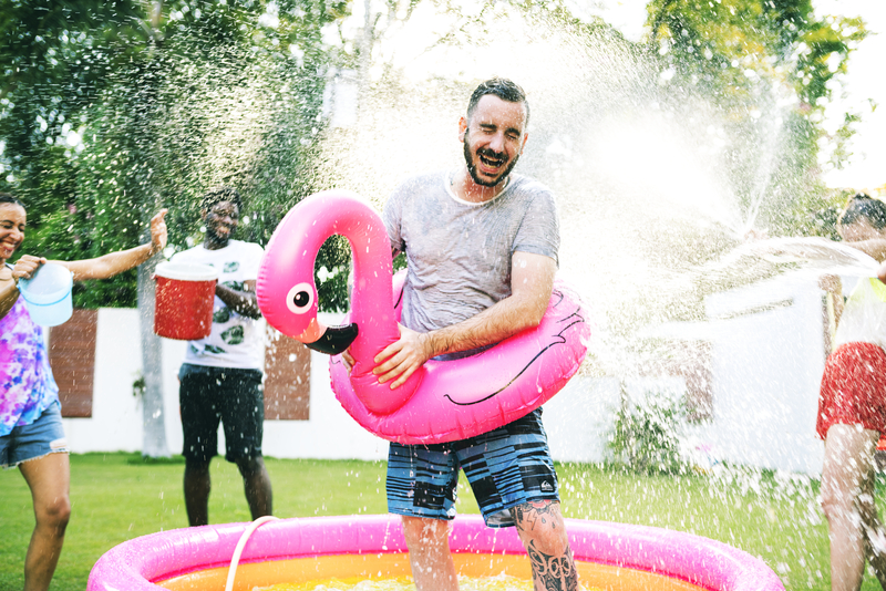 diverse group friends enjoying summer time splashing water 1